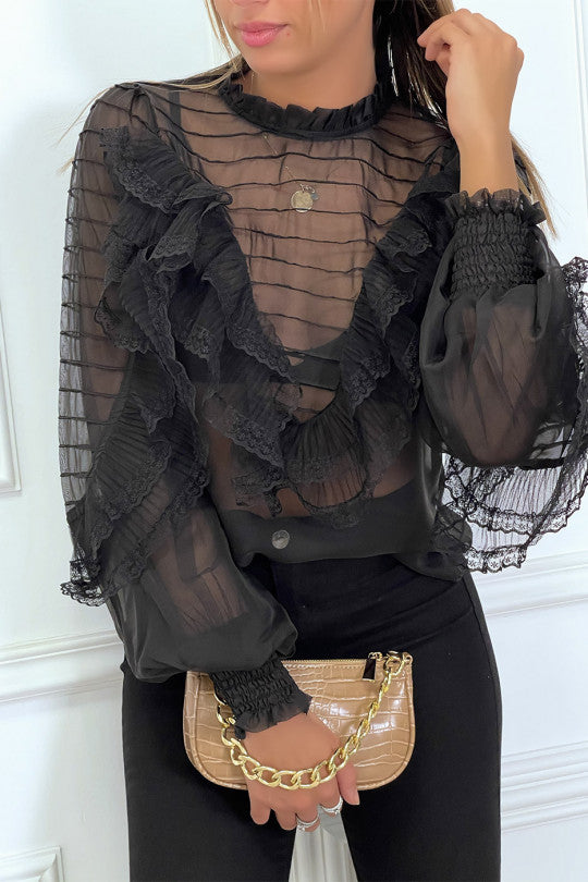 Blouse noir en tulle avec broderie et volant